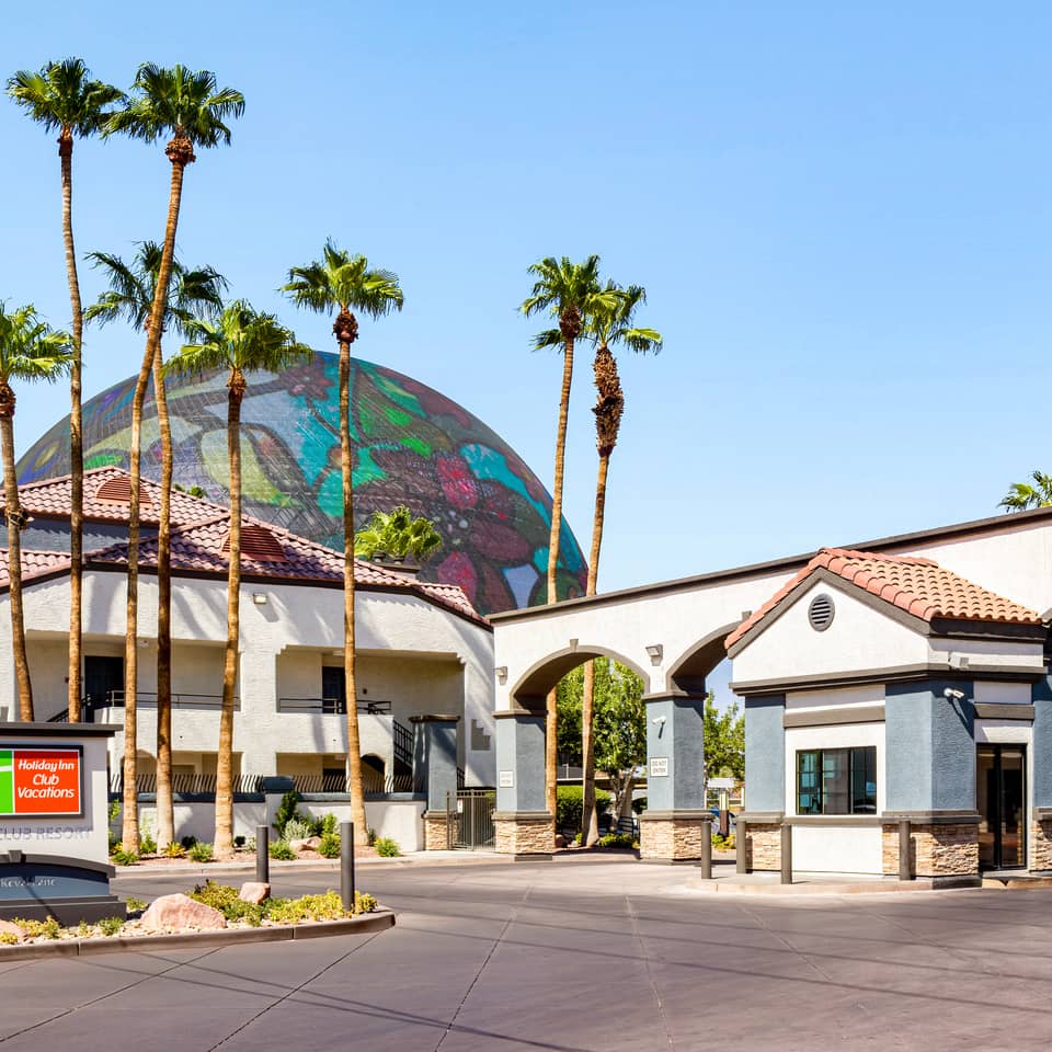 Entrance of Desert Club Resort in Las Vegas, Nevada with the Sphere behind.