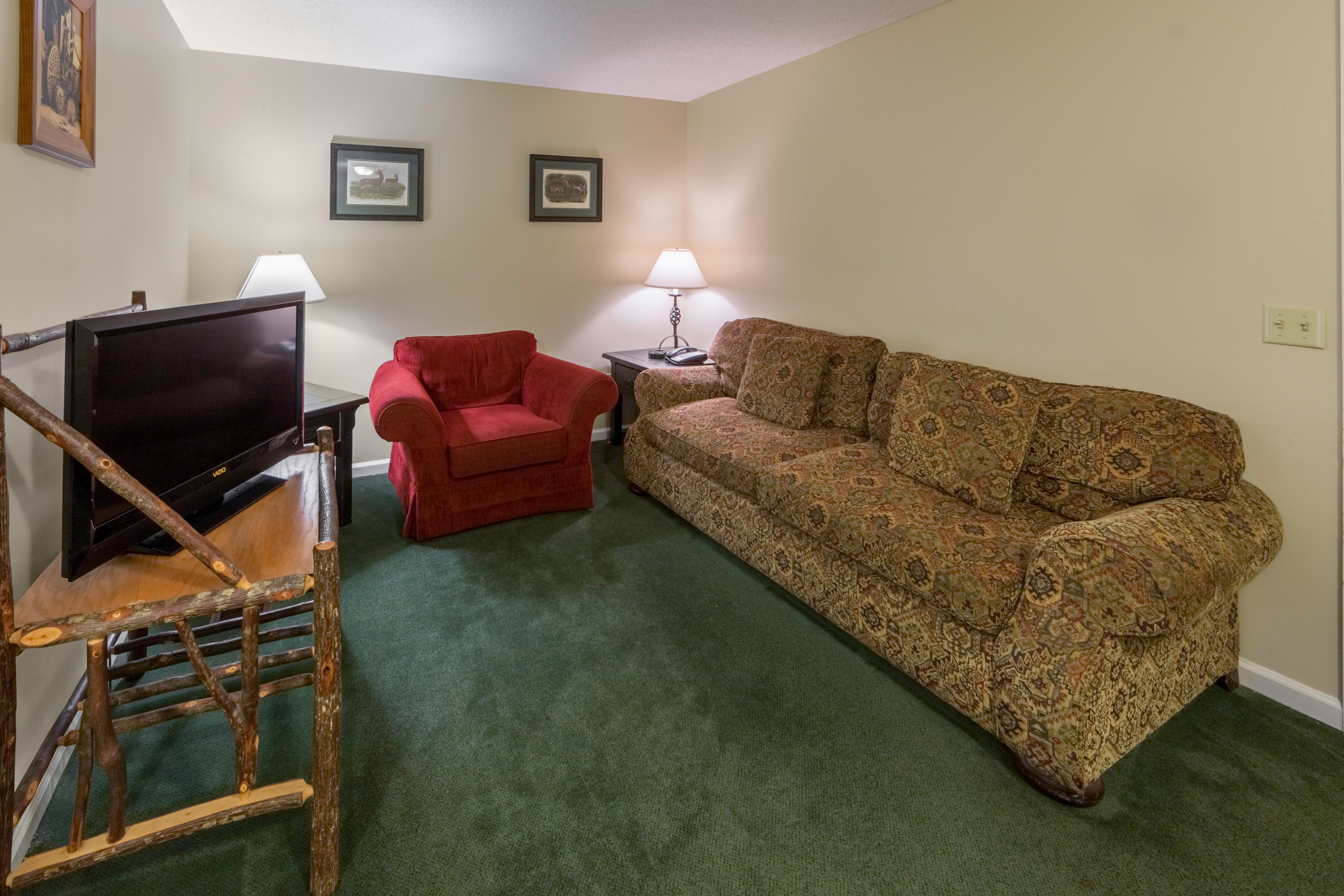 Living room in a three bedroom villa at Oak n' Spruce Resort in South Lee, Massachusetts