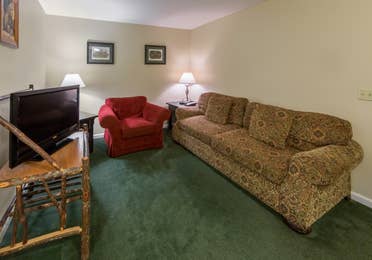 Living room in a three bedroom villa at Oak n' Spruce Resort in South Lee, Massachusetts