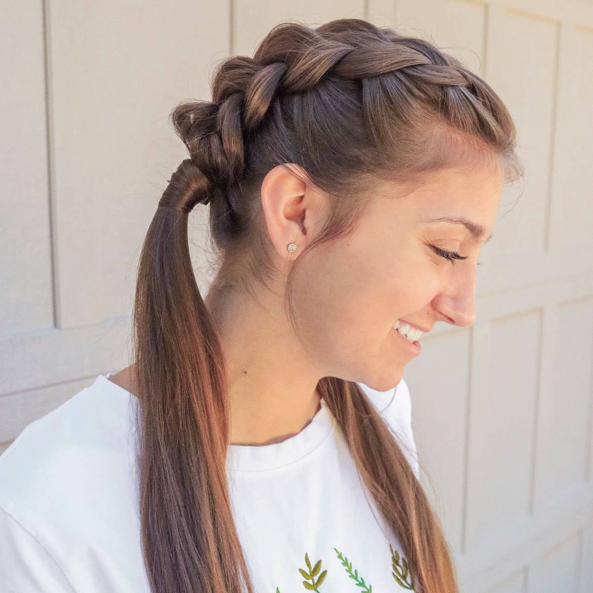 Mindy's daughter, Kamri, sporting the dutch-braid hairstyle from a profile.