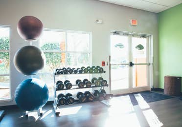 Fitness center with yoga balls and free weights in River Island at Orange Lake Resort near Orlando, Florida.