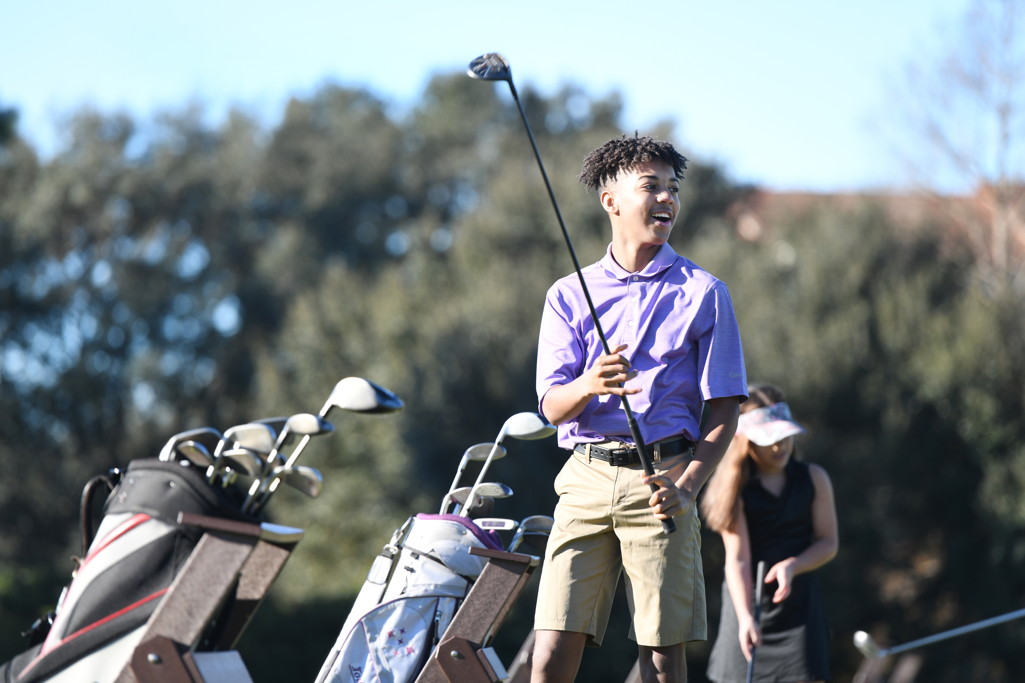 Young golfer preparing to swing at Orange Lake Resort near Orlando, Florida