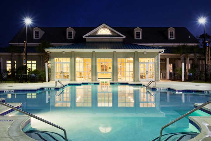 Exterior view of the pool at night at South Beach Resort