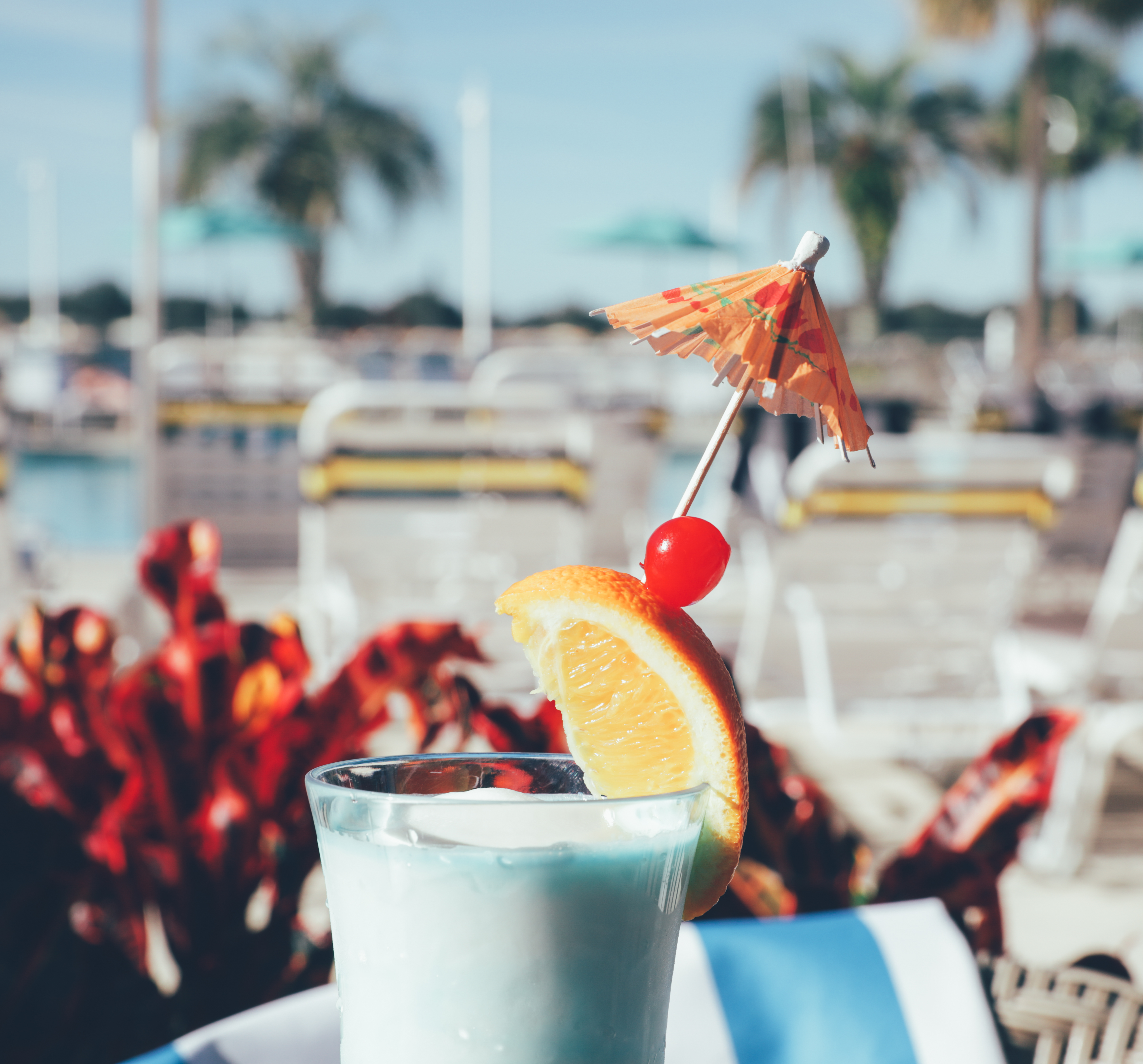 Frozen, fruity cocktail drink near the pool loungers at Orange Lake Resort