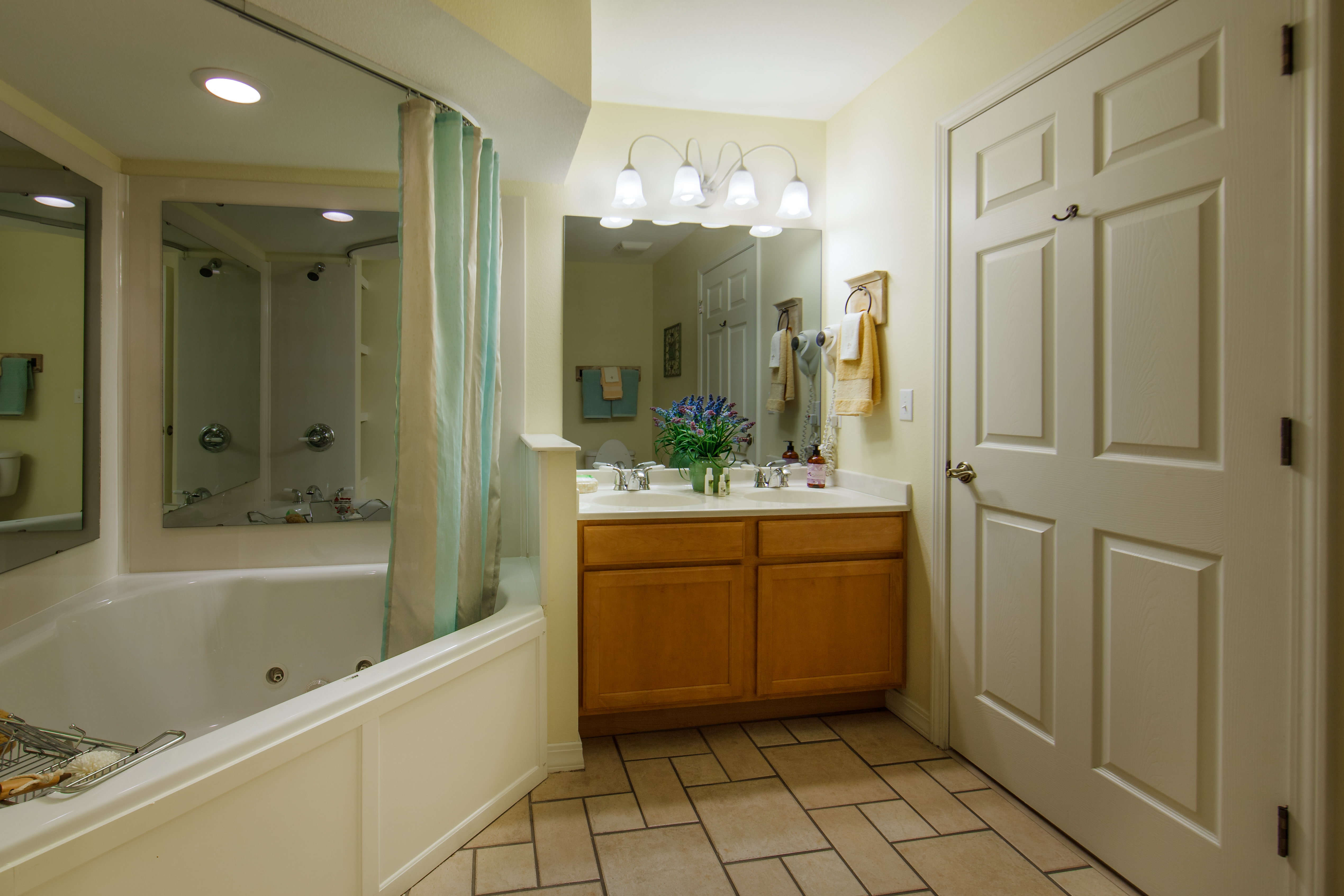 Bathroom with garden tub in a two-bedroom presidential villa at the Holiday Hills Resort in Branson Missouri.