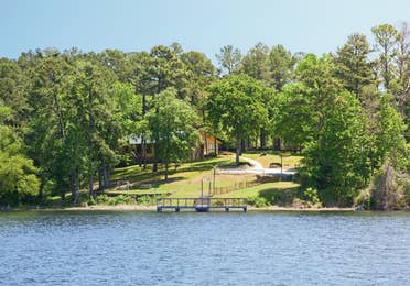Lake view property with dock and villa at the Lake O' the Wood Resort in Flint Texas.