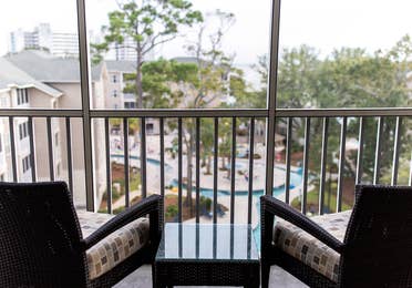 Balcony looking over lazy river in a four-bedroom Signature Collection villa at South Beach Resort in Myrtle Beach, South Carolina.
