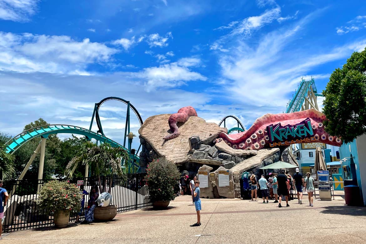 A marquee in the shape of a giant tentacle that reads, ‘Kraken Unleashed’ near its namesake rollercoaster in SeaWorld Orlando.