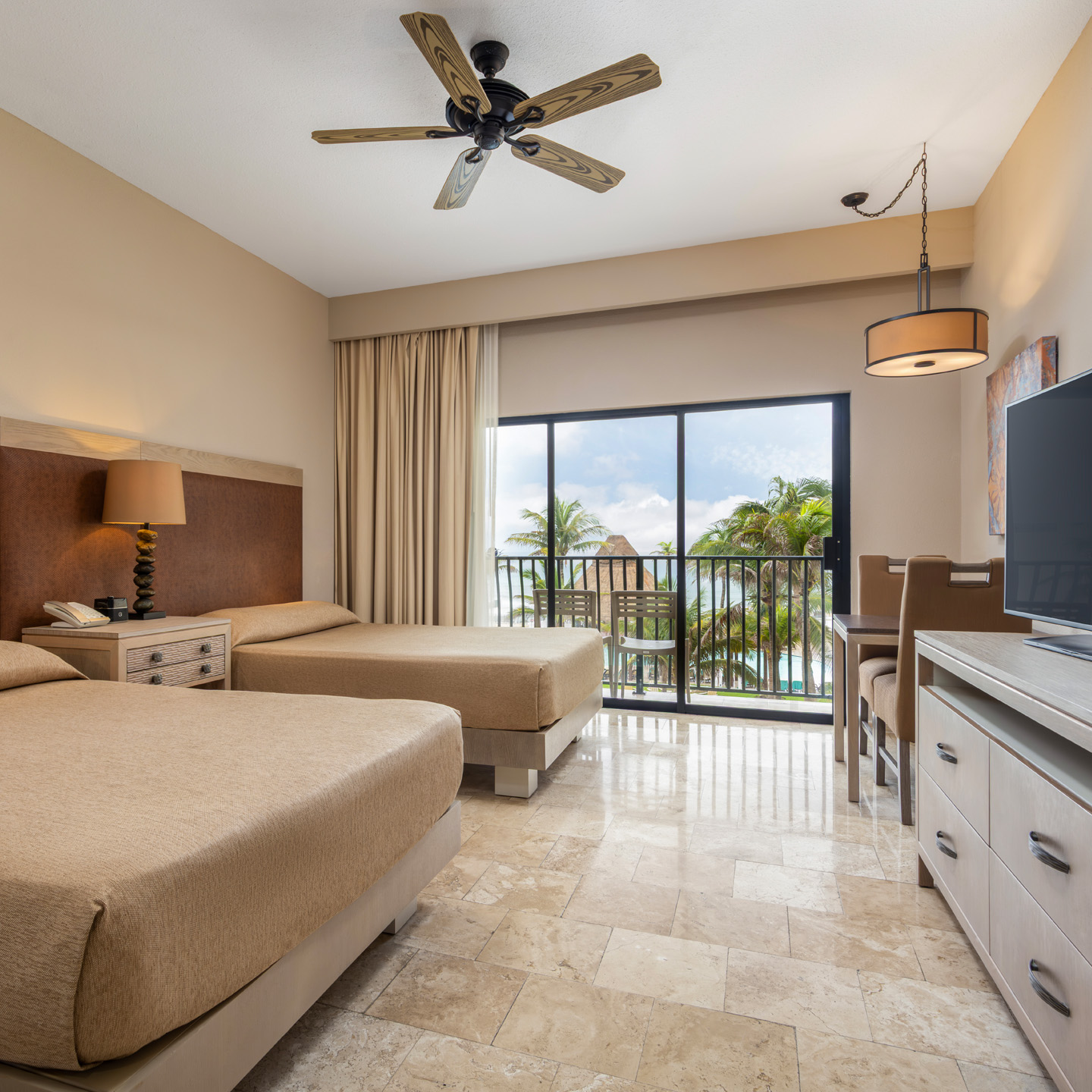 Spacious bathroom with granite vanity and tub-shower combo.