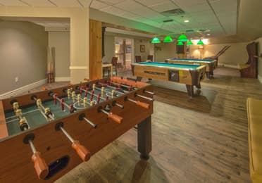 A foosball and two billiard tables in Sidewinders Arcade at Mount Ascutney Resort in Brownsville, VT.