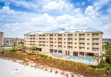 View of property building and ocean at Panama City Beach Resort.
