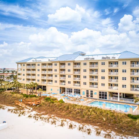 View of property building and ocean at Panama City Beach Resort.