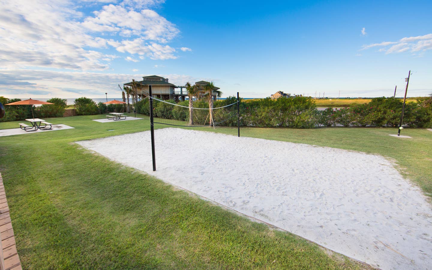 Outdoor sand volleyball court at Galveston Beach Resort in Texas.