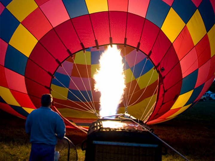 A hot air balloon being lit
