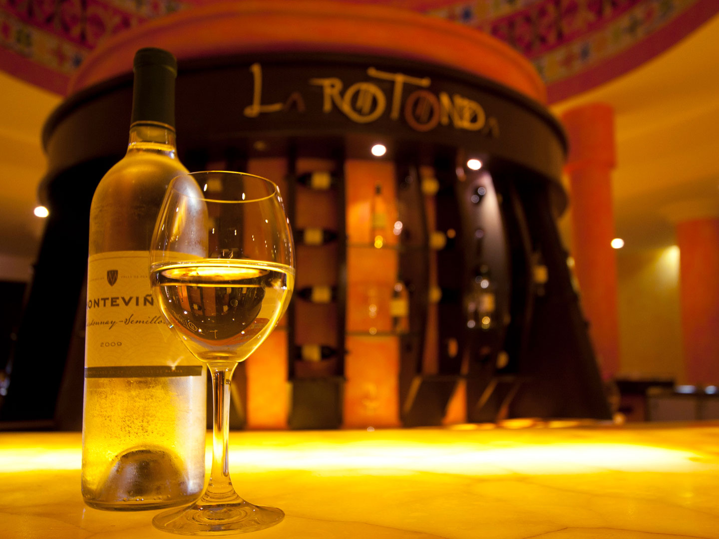 At the LaRotunda, a bottle and glass of white wine, at The Royal Haciendas, in Playa del Carmen, Mexico