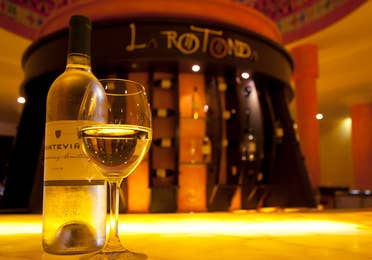 At the LaRotunda, a bottle and glass of white wine, at The Royal Haciendas, in Playa del Carmen, Mexico