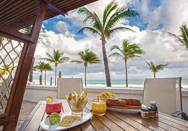 Bar with a beach view at the Grand Residences Resort in Puerto Morelos, Mexico