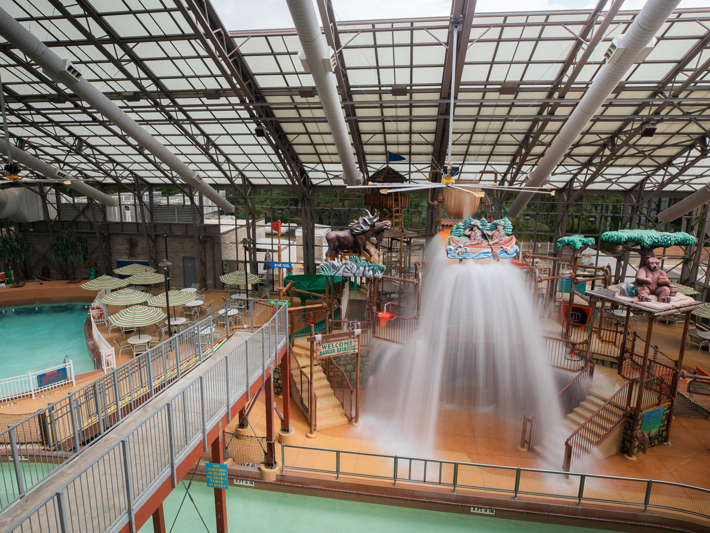 View from top of Waterpark at the Villages with fountain, pool and lazy river at Villages Resort in Flint, Texas.