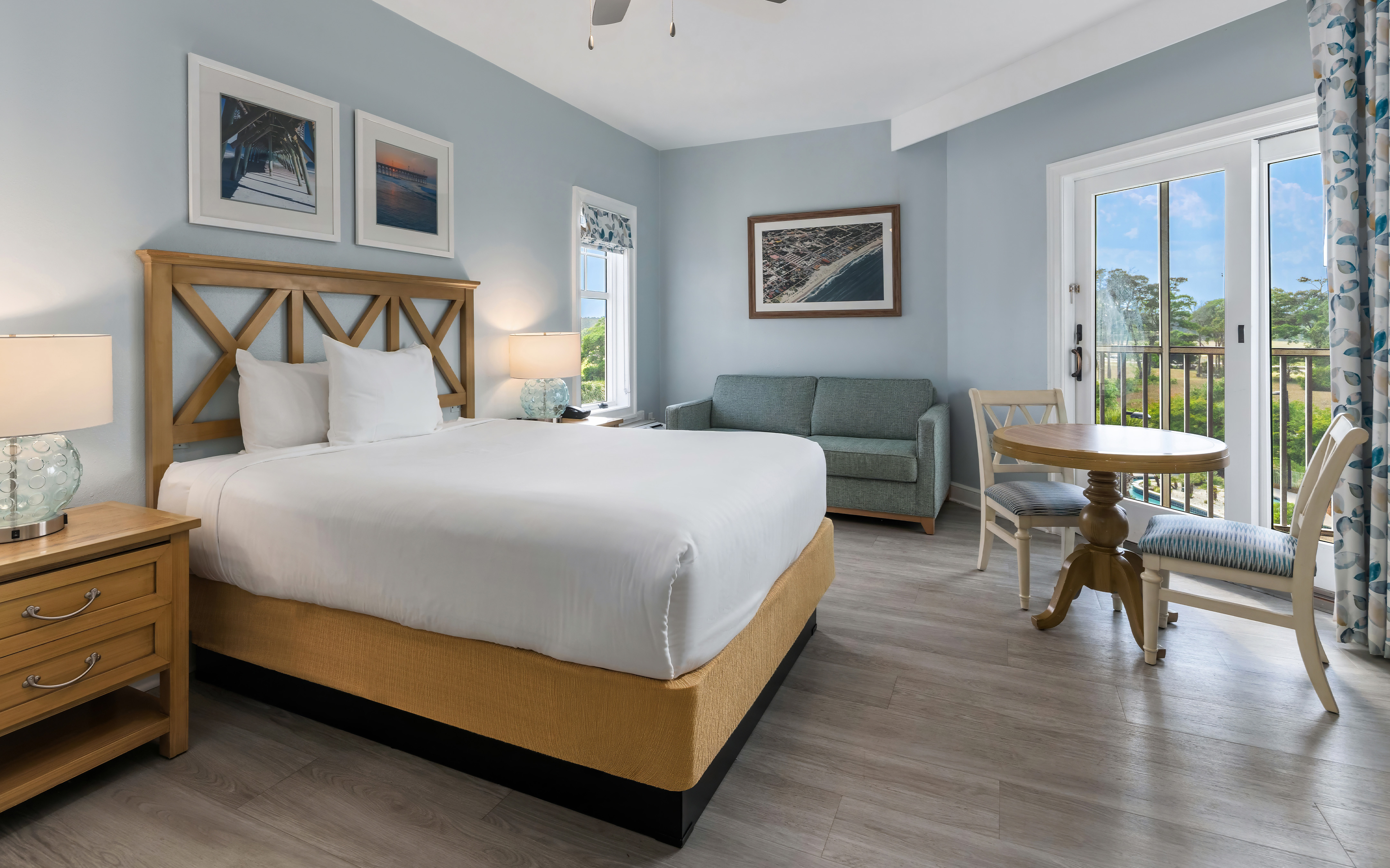 Studio room with a bed, couch and sitting area at South Beach Resort in Myrtle Beach, South Carolina.