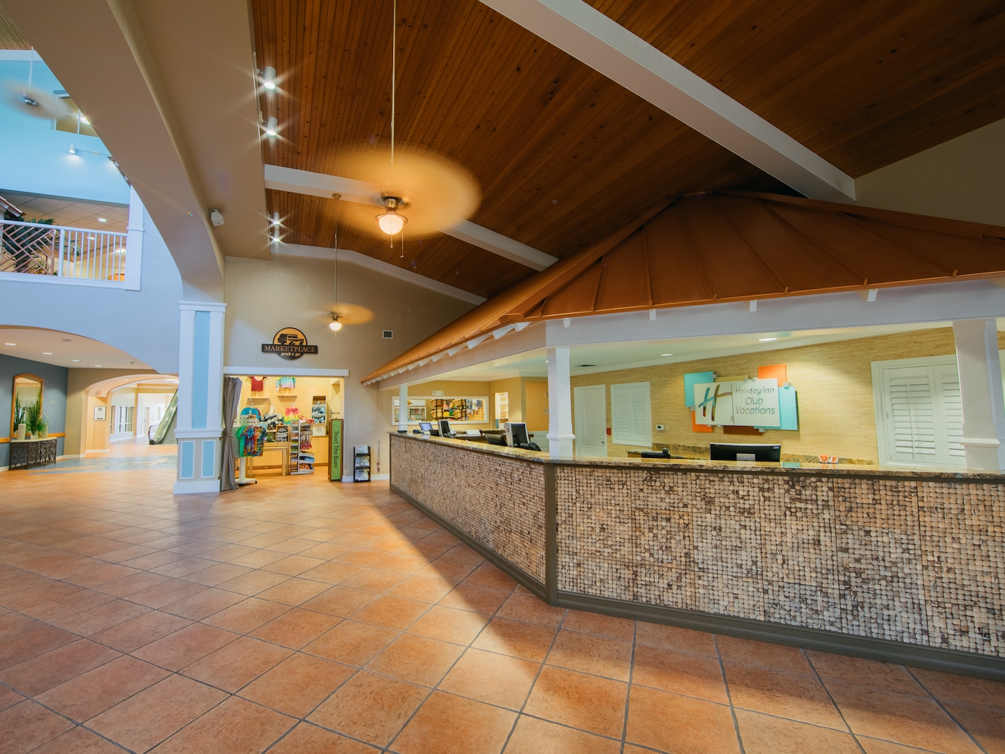 Lobby and front desk at Cape Canaveral Beach Resort in Florida.