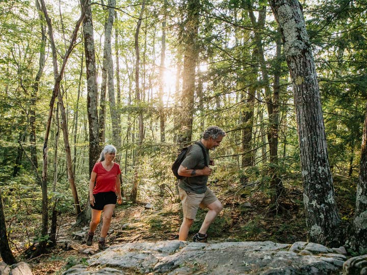 couple hiking near apple mountain resort at Clarkesville, Georgia