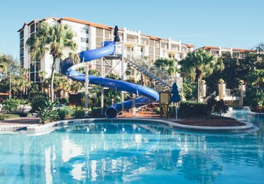 Pool with water slide in River Island at Orange Lake Resort near Orlando, Florida.
