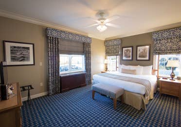 Master bedroom in a one-bedroom villa at Williamsburg Resort