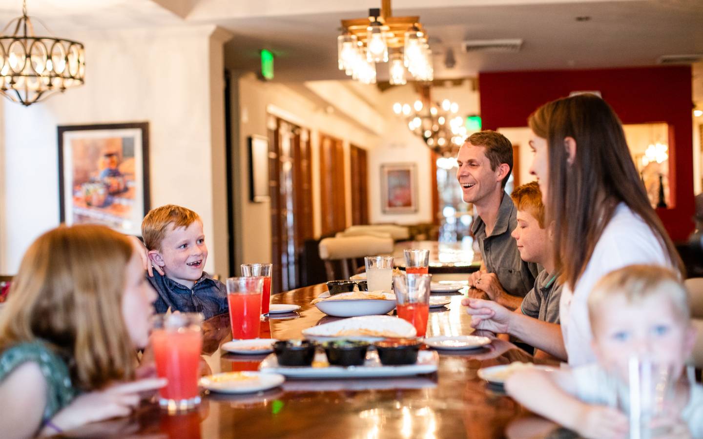 Family eating at ArteZania Kitchen & Cantina at Scottsdale Resort.
