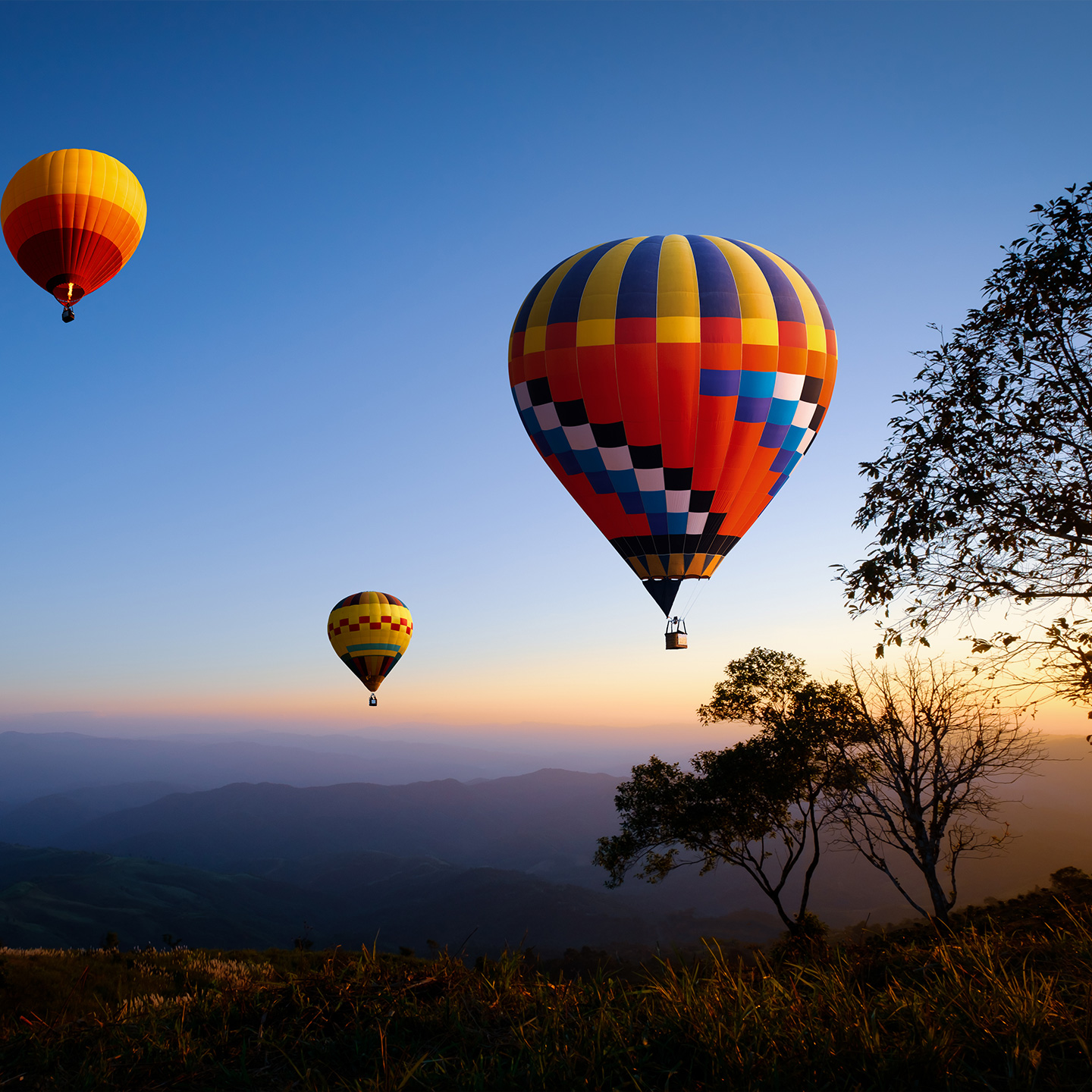Three hot air balloons in the sky