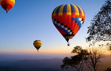 Three hot air balloons in the sky