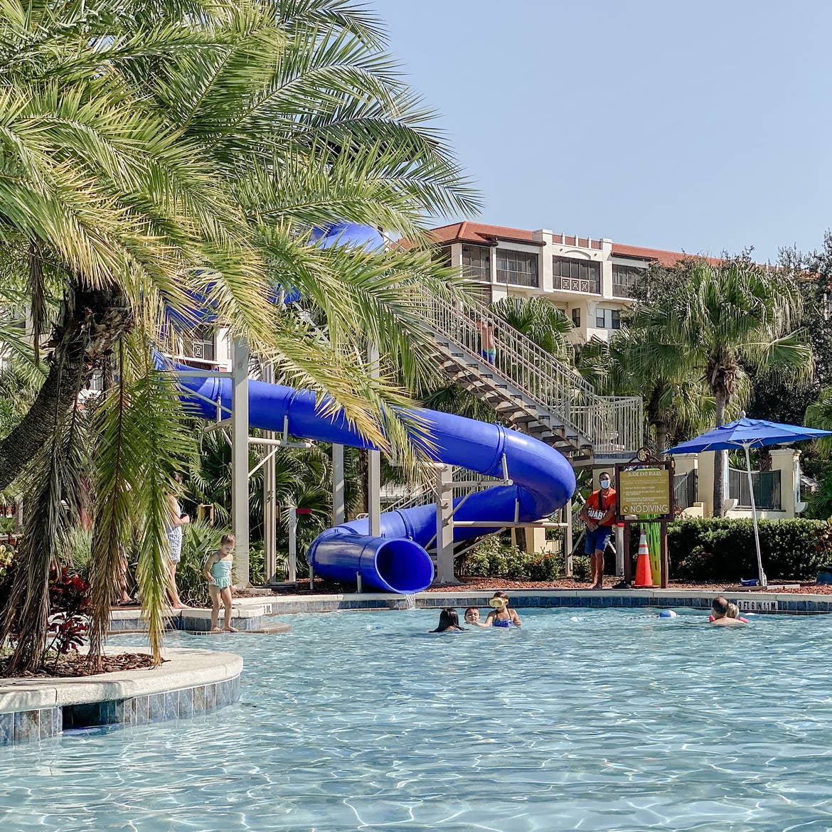 Guests enjoy a swim in our pool at Orange Lake Resort in Florida.