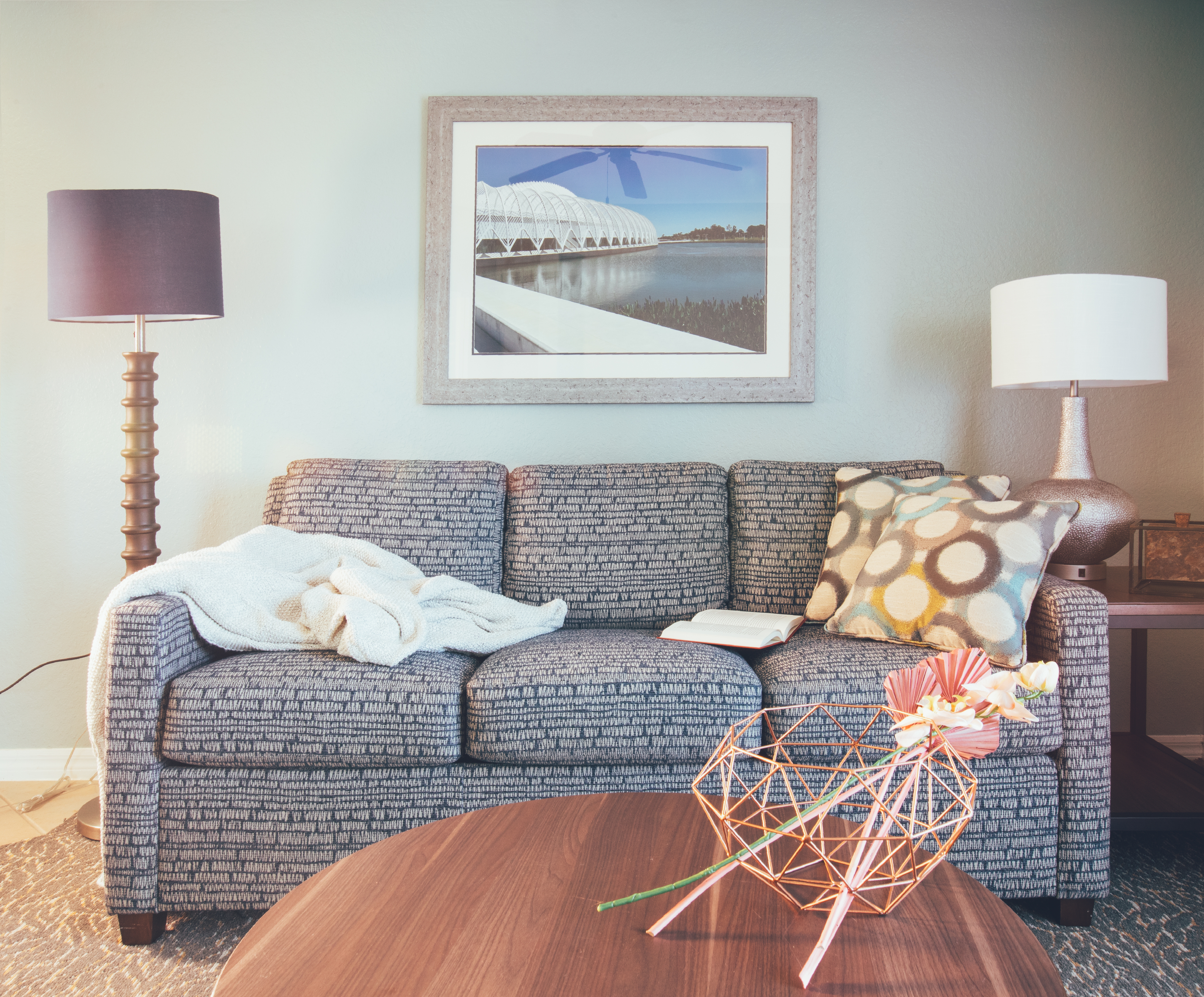 Couch and dining table in a one bedroom villa in River Island at Orange Lake Resort near Orlando, Florida