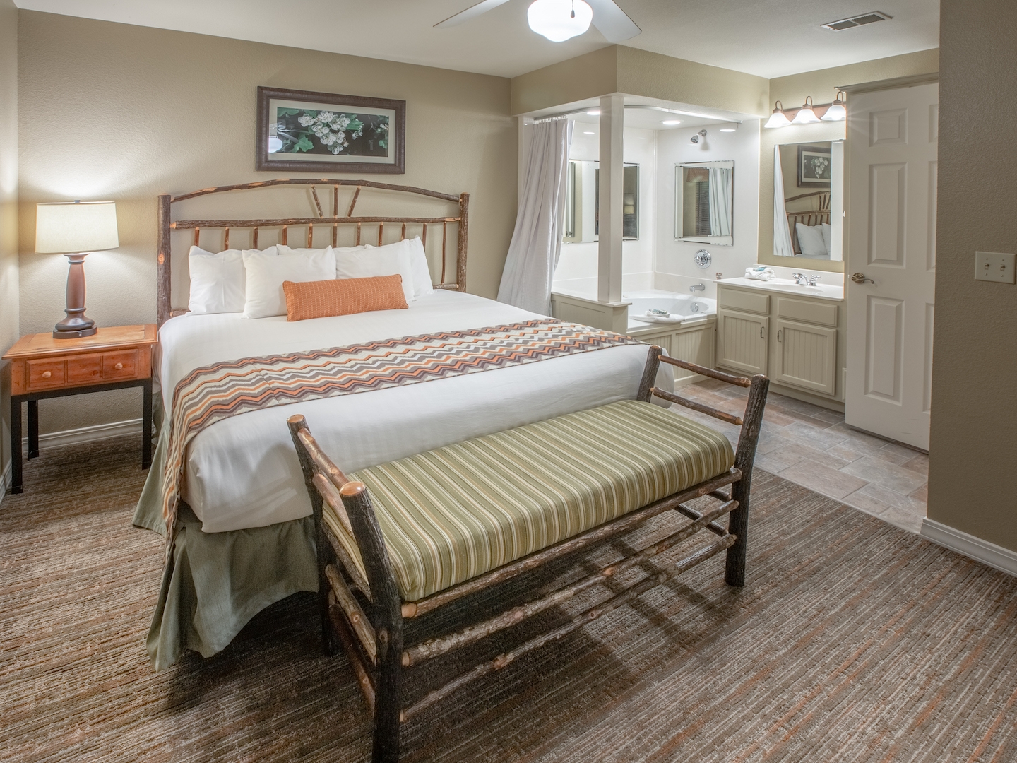 Bedroom in a two-bedroom villa at Holiday Hills Resort in Branson, MO.