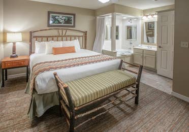 Bedroom in a two-bedroom villa at Holiday Hills Resort in Branson, MO.