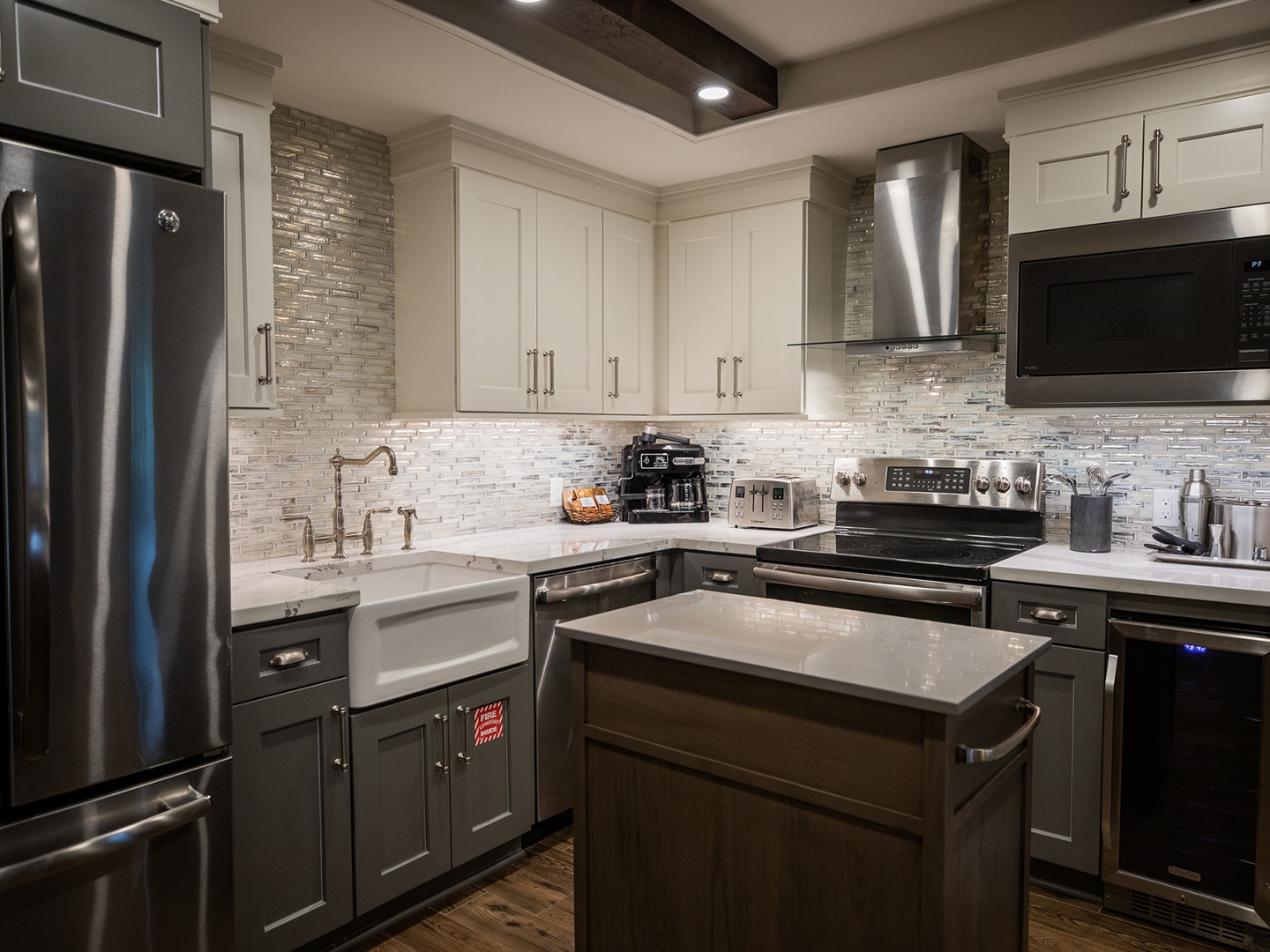 Full kitchen with stainless steel appliances in a two-bedroom Signature Collection villa at Cape Canaveral Beach Resort.