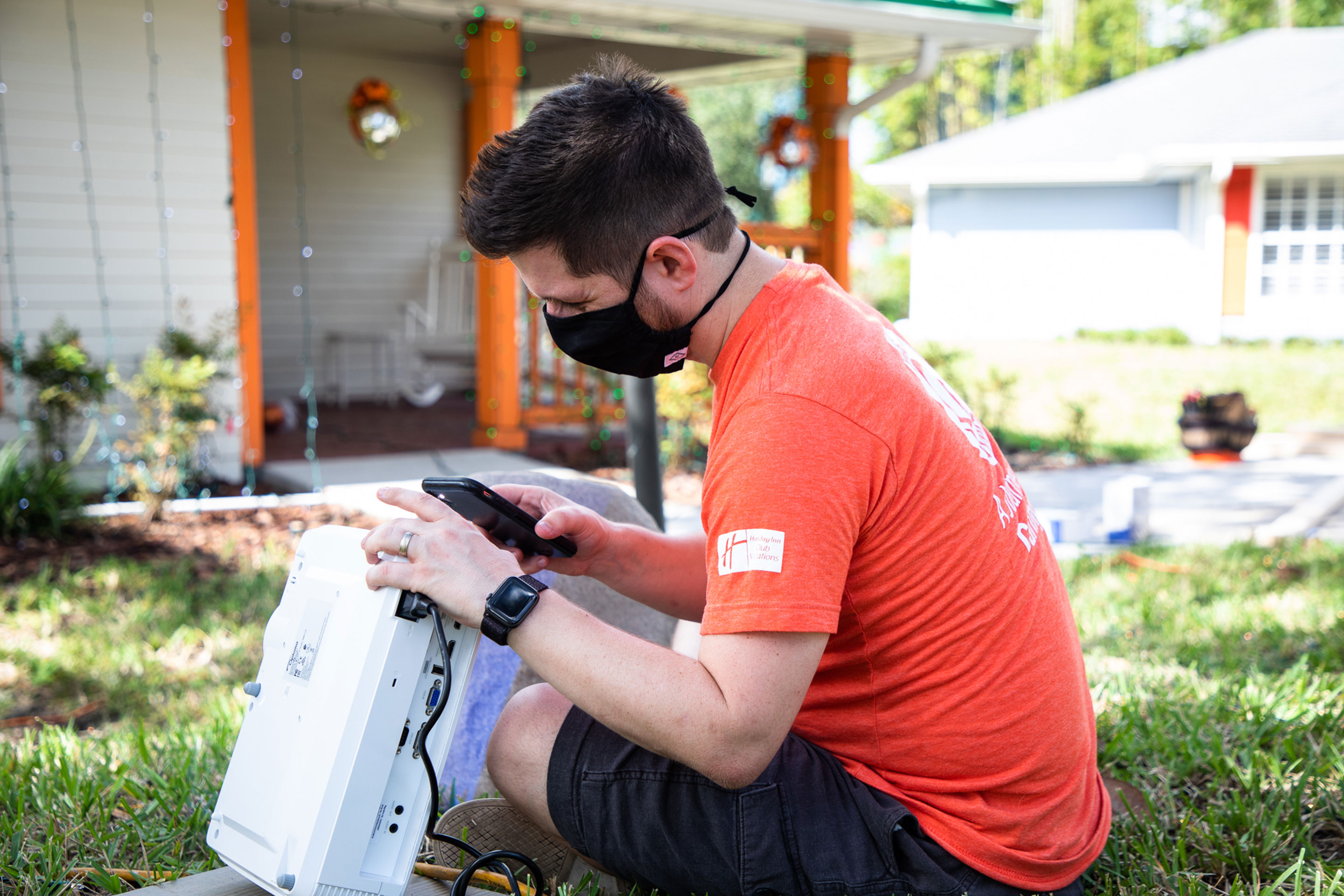 An HICV volunteer calibrated the projector for the villa decor.