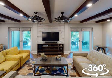 Four-Bedroom Signature Collection living room at Cape Canaveral Beach Resort.
