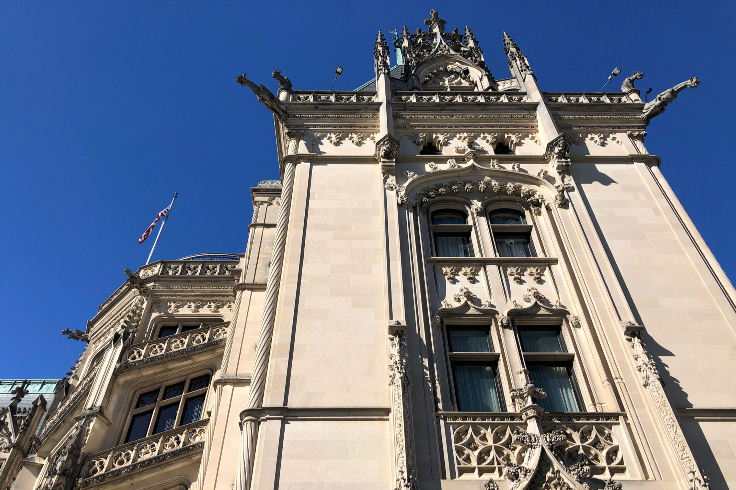 The exterior of the Biltmore Estate under a blue sky.