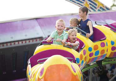 Children enjoying a kiddie ride