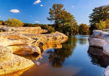 RIver and rocks view at McKinney Falls State Park near Hill Country Resort, TX