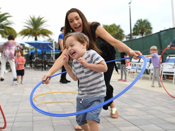 Children hula-hooping at Orange Lake Resort near Orlando, Florida.