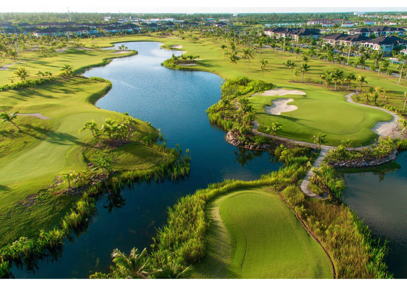Lush golf course in Marco Island, Florida, surrounded by palm trees and scenic views.