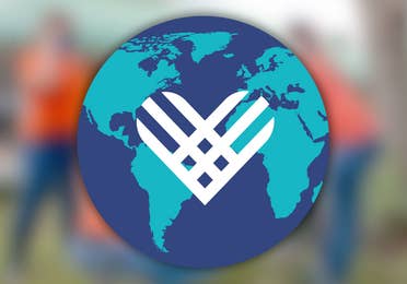 Giving Tuesday Globe logo on top of a blurred image.