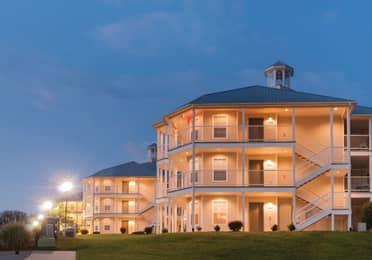 Villa lit up at night at the Holiday Hills Resort in Branson, Missouri