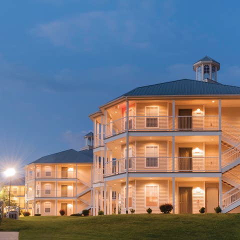Villa lit up at night at the Holiday Hills Resort in Branson, Missouri