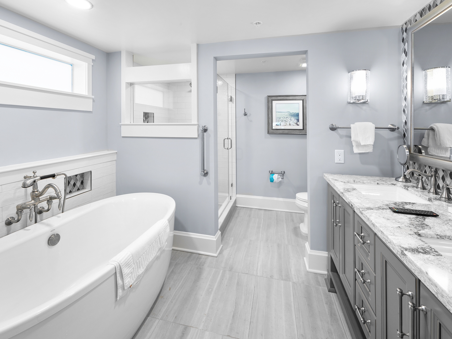 Bathroom with garden tub in a four-bedroom Signature Collection villa at Cape Canaveral Resort.