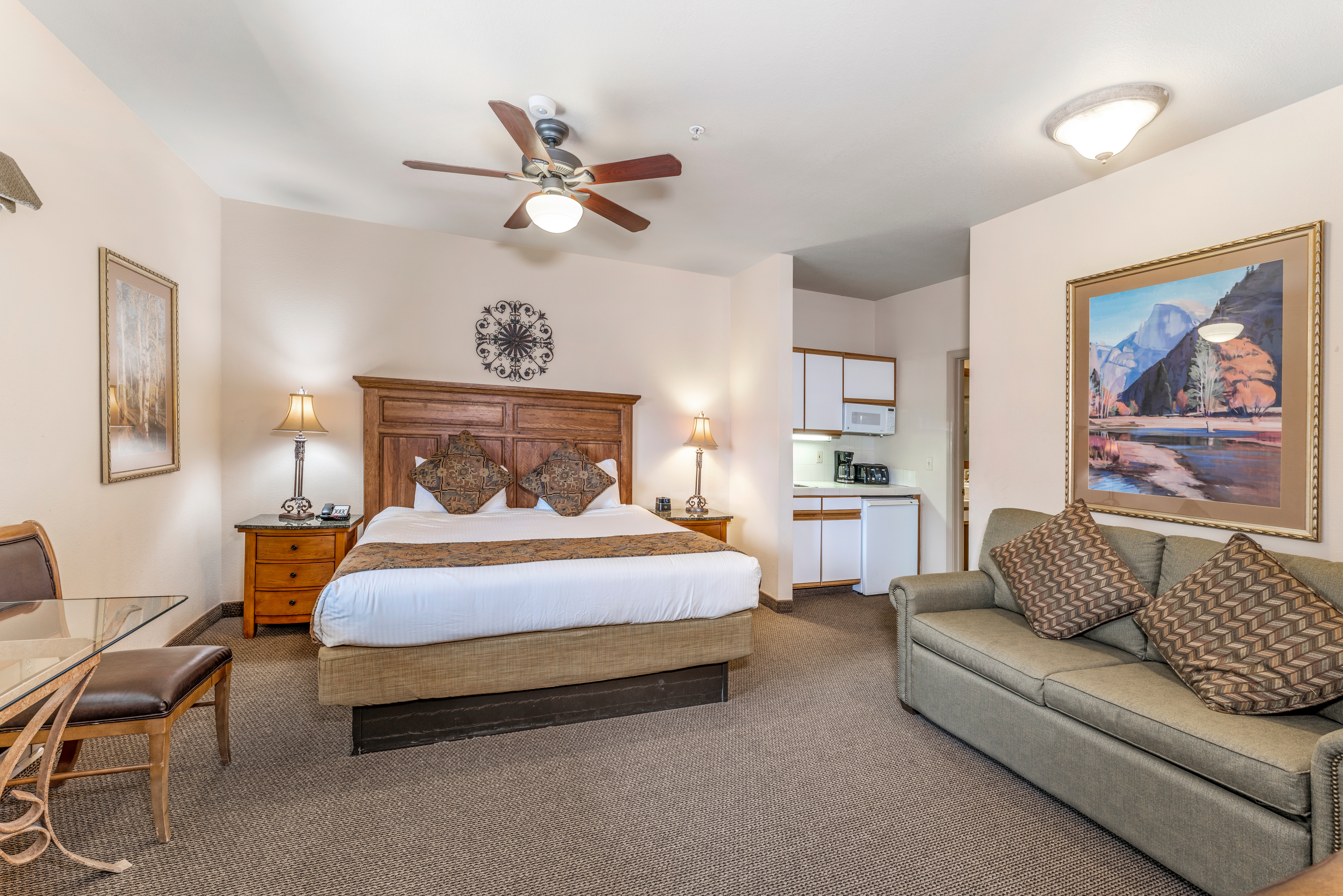 Bed and living area in a Ridge Pointe villa at Tahoe Ridge Resort