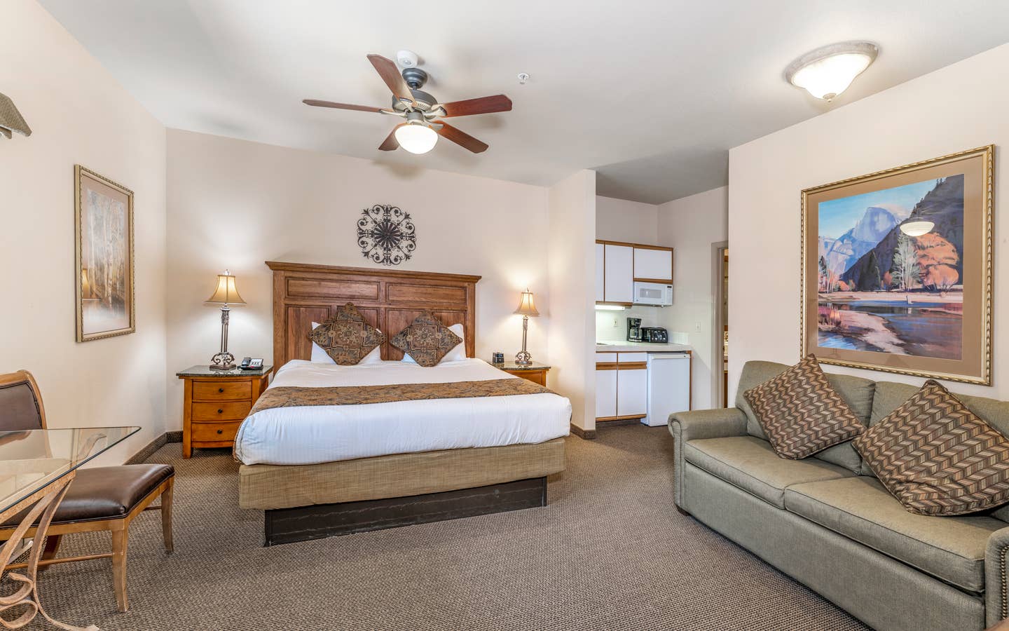Bed and living area in a Ridge Pointe villa at Tahoe Ridge Resort