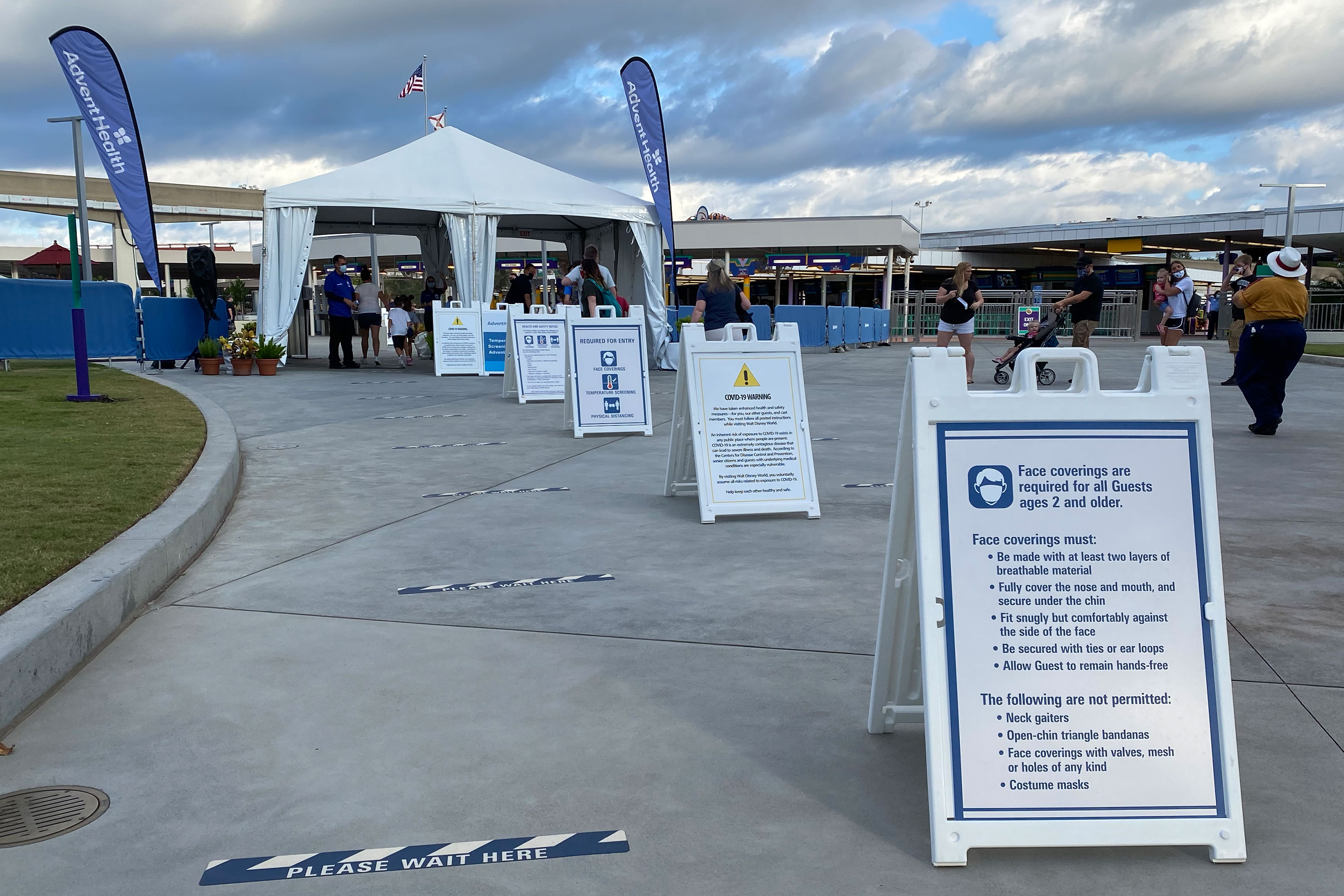 Magic Kingdom Transportation center entrance with safety instructions for guests to follow upon park arrival.