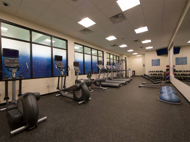 Fitness center with weights, treadmills and ellipticals at Williamsburg Resort in Virginia.